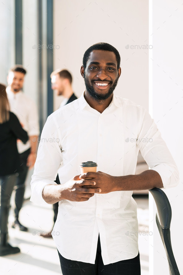 Black office worker on coffee break