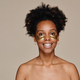 Smiling Black Woman Enjoying Skincare - PhotoDune Item for Sale