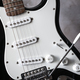 Electric guitar white and black color closeup detail - PhotoDune Item for Sale
