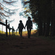 Mom and son walk hand in hand in a forest - PhotoDune Item for Sale