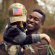 American Soldier In Uniform Returning Home To Family On Leave With Son Wearing Army Cap - PhotoDune Item for Sale