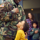 American Soldier In Uniform Returning Home To Family On Hugging Children Outside House - PhotoDune Item for Sale