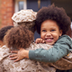 American Female Soldier In Uniform Returning Home To Family On Hugging Children Outside House - PhotoDune Item for Sale