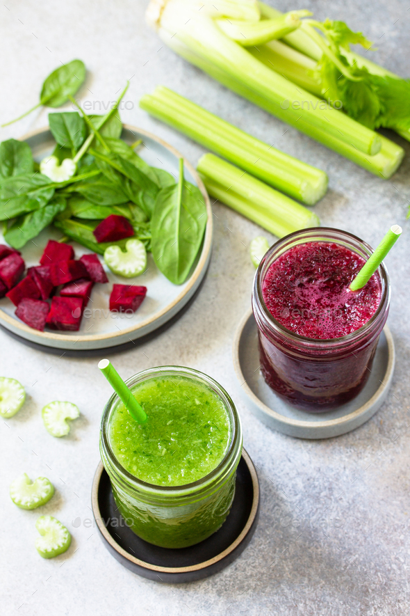 Vegetarian concepts drinks. Beet smoothie and green smoothie celery and