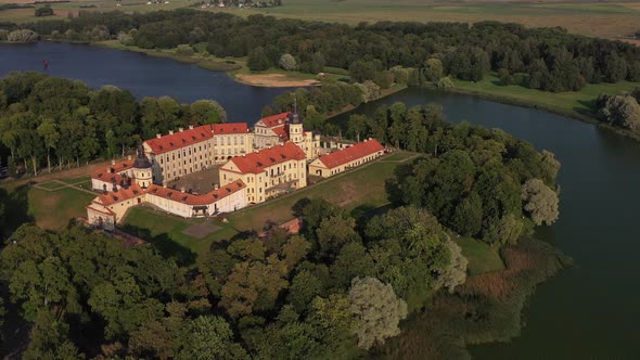 Flying Over the Nesvizh Castle, the Park Around the Castle and the Lake, Aerial Video of Nesvizh alt