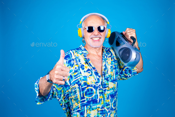Old man dancing with vintage radio dancing having fun isolated