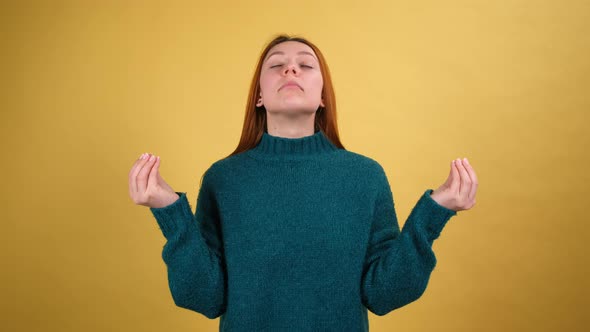 Young Red Hair Woman Posing Isolated on Yellow Color Background Studio alt