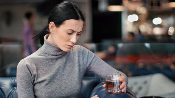 Betrayal Woman at Bar with Alcohol Feeling Pain Broken Heart alt