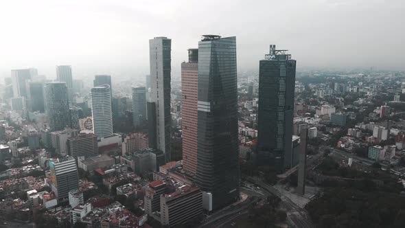 Reforma avenue on Mexico city on a cloudy morning at the sunrise. Reforma Skyline at Mexico city. Sk alt
