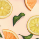 Citrus slices and mint herbs pattern on retro pink background from above. - PhotoDune Item for Sale