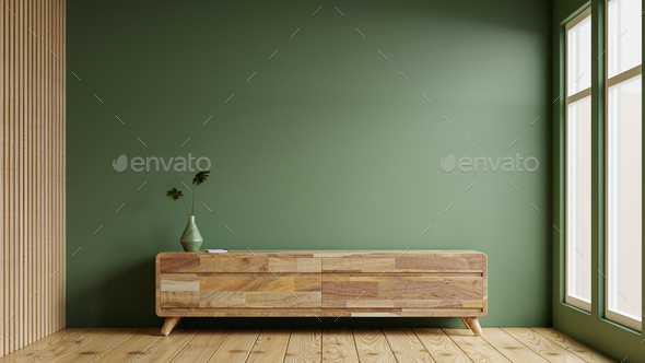 Green color wall background,Modern living room decor with a tv cabinet.  Stock Photo by vanitjan