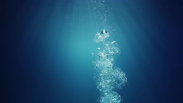 Underwater sunlight beams shining from above coming through the deep crystal clear blue water causin alt