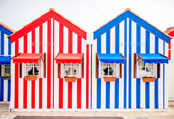 Beautiful colorful houses at the Costa Nova beach in Portugal - Stock Photo - Images