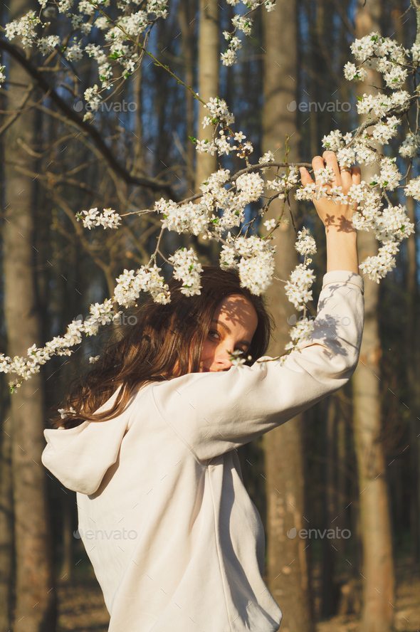 Portrait Of Young Beautiful Woman Among Flowering Trees Fashion And Beauty Spring Concept