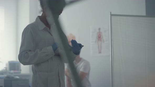 Doctor Woman Analysing Health History on Tablet Close Up alt