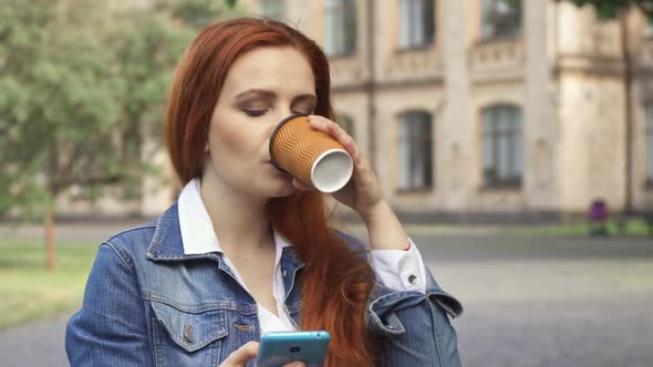 Female Student Drinks Coffee on Campus