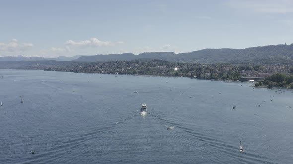 4k ungraded drone Aerial view of Zurich  city waterfront in Switzerland