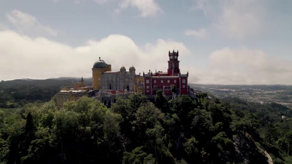 Pena Palace, hilltop Romanticist castle in Sintra, Portugal. Aerial shot alt