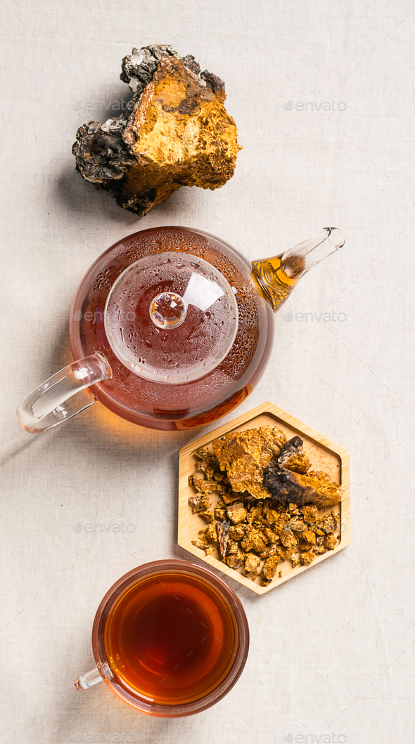 Healthy eating. Fashionable food drinks. Healing healthy forest mushroom tea glass mug teapot