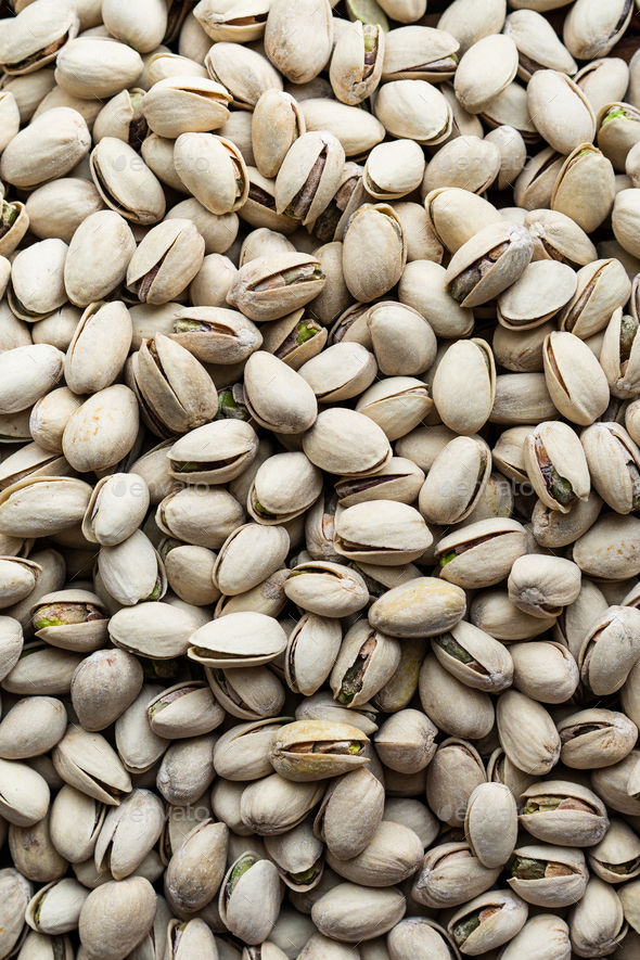 Background of organic pistachios. Natural pure pistachios nuts. Healthy