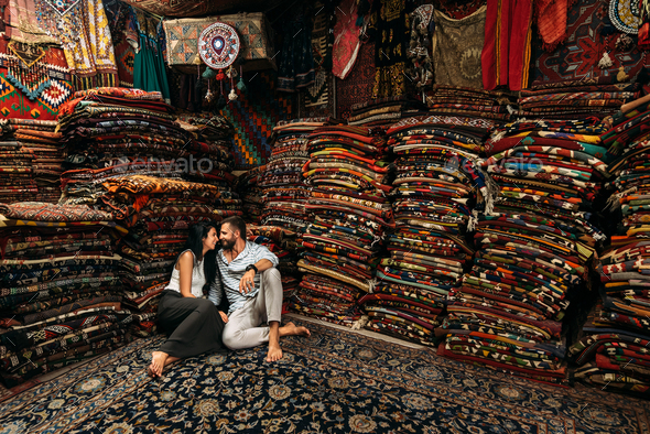 Couple having fun. Couple in love in Turkey. Man and woman in the Eastern country. Gift shop