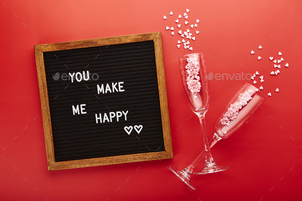 Letter board on red background. Top view. Background for Valentine\'s day