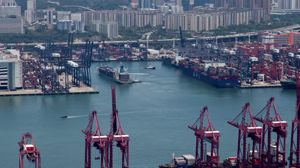 Timelapse Vessels at Hong Kong Harbour Berths with Cranes alt