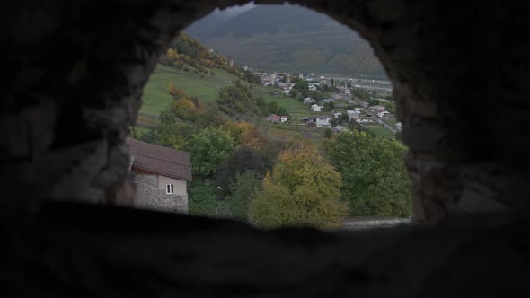 Looking at village through a tower hole