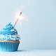 Blue celebration cupcake with sparkler and sprinkles - PhotoDune Item for Sale