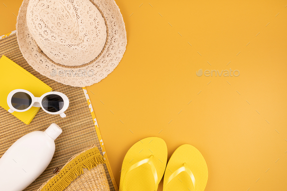 Flat lay with summer accessories for woman. Sun hat, sunglasses, sunscreen  protection, flip flops Stock Photo by OksaLy