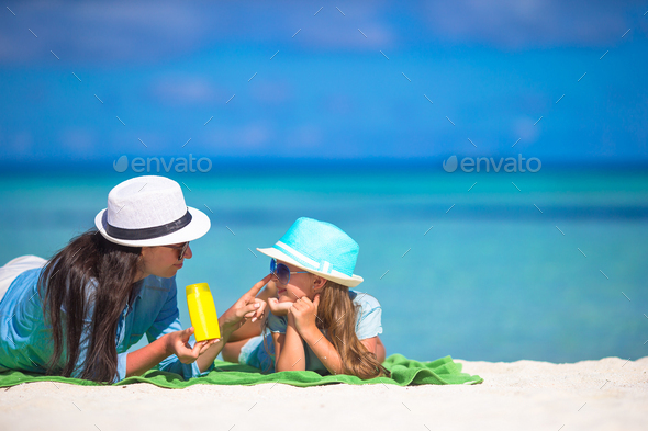 Child protection sun cream - Stock Photo - Images