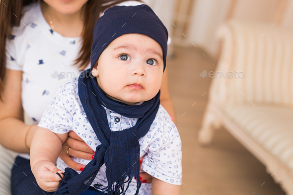 Portrait of cute baby boy wearing blue hat Stock Photo by Satura ...