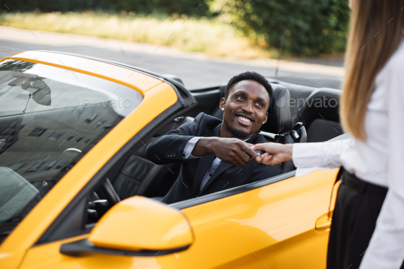 African businessman in a Car Rental Service - Stock Photo - Images