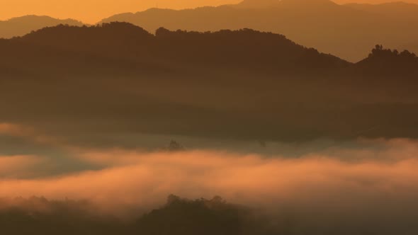 Beautiful landscape sunbeam with fog at morning,
