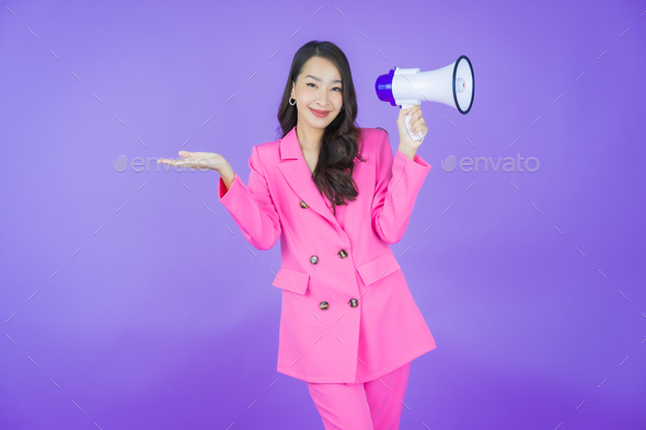 Portrait beautiful young asian woman smile with megaphone - Stock Photo - Images