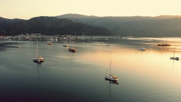 Landscape Panorama with Yacht in Harbor and Mountains in the Background alt