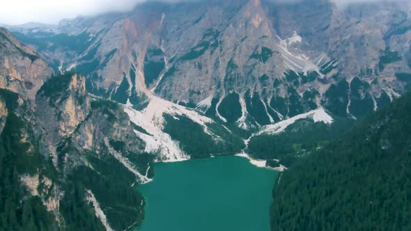 Beautiful Landscape of Braies Lake Lago Di Braies Romantic Place with Wooden Bridge and Boats on the alt