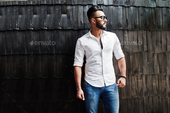 Stylish tall arabian man model in white shirt