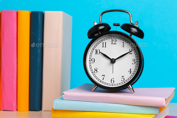 Back to school background with books and alarm clock Stock Photo by ...