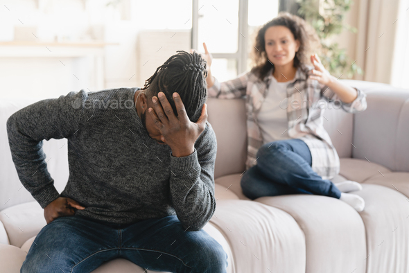 Wife Crying Arguing Scolding At Her Husband At Home. Misunderstanding 