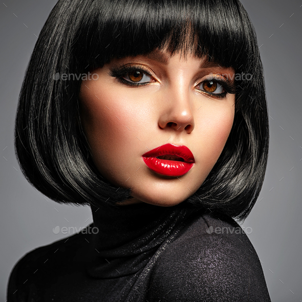 Beautiful woman Face with a bang. Model looking at camera. Sexy woman looks  at camera. Stock Photo by valuavitaly