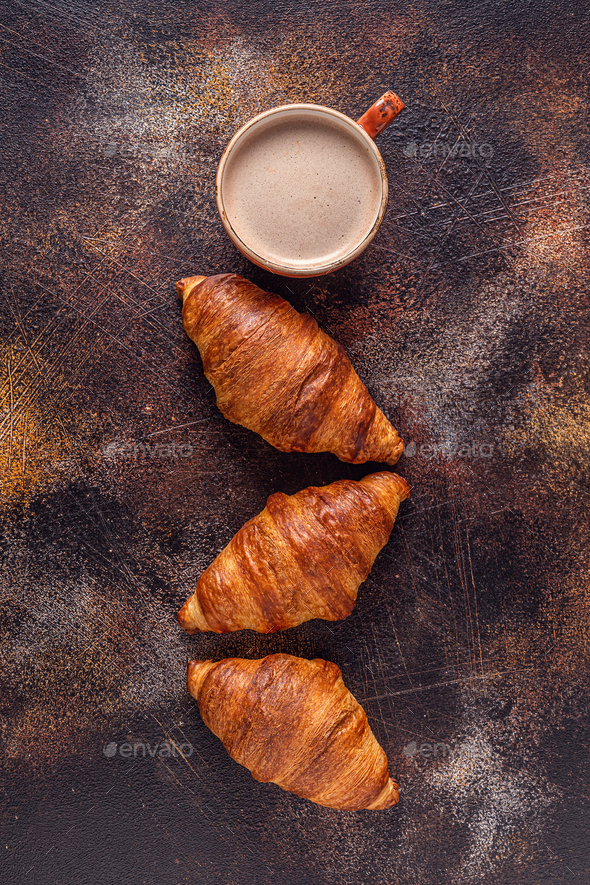 Coffee and croissant on stone background. - Stock Photo - Images