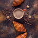 Coffee and croissant on stone background. - PhotoDune Item for Sale