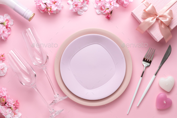 Place setting for Valentine\'s Day. Romantic dinner, table setting with cutlery.