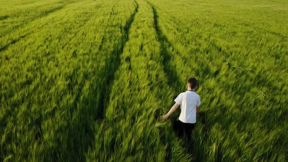 Children Running in Field alt