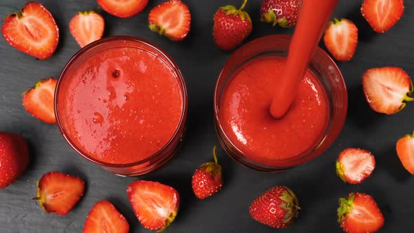 Fresh Strawberry Smoothie Flowing in Glasses