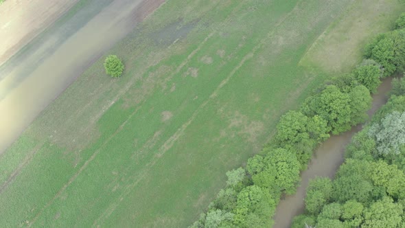 Floods from nearby river water 4K aerial video alt