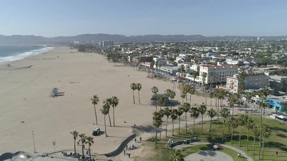 Aerial view of the beach and a park alt