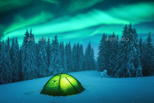 Yellow tent against the backdrop of incredible starry sky Stock Photo