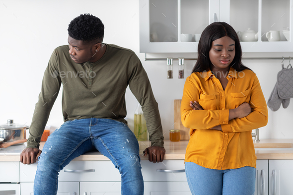 Relationship Crisis. Portrait Of Offended Black Couple Standing In Kitchen After Argue